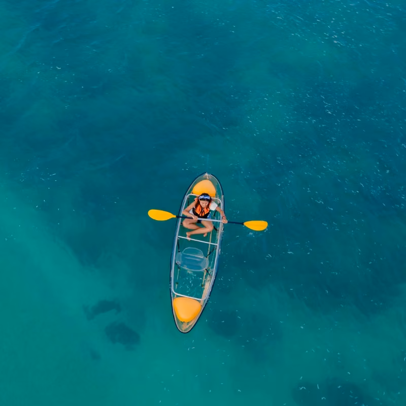 Instagram post by The Village at Burleigh, tile 4 Clear kayak on the turquoise water of Tallebudgera Creek near Burleigh Heads, Gold Coast